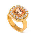 Isolated rounded-square peach stone halo ring