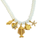 Fishbone charm necklace with shell and starfish details