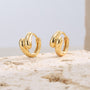 gold plated brass triple-lobe huggie hoop earrings on stone