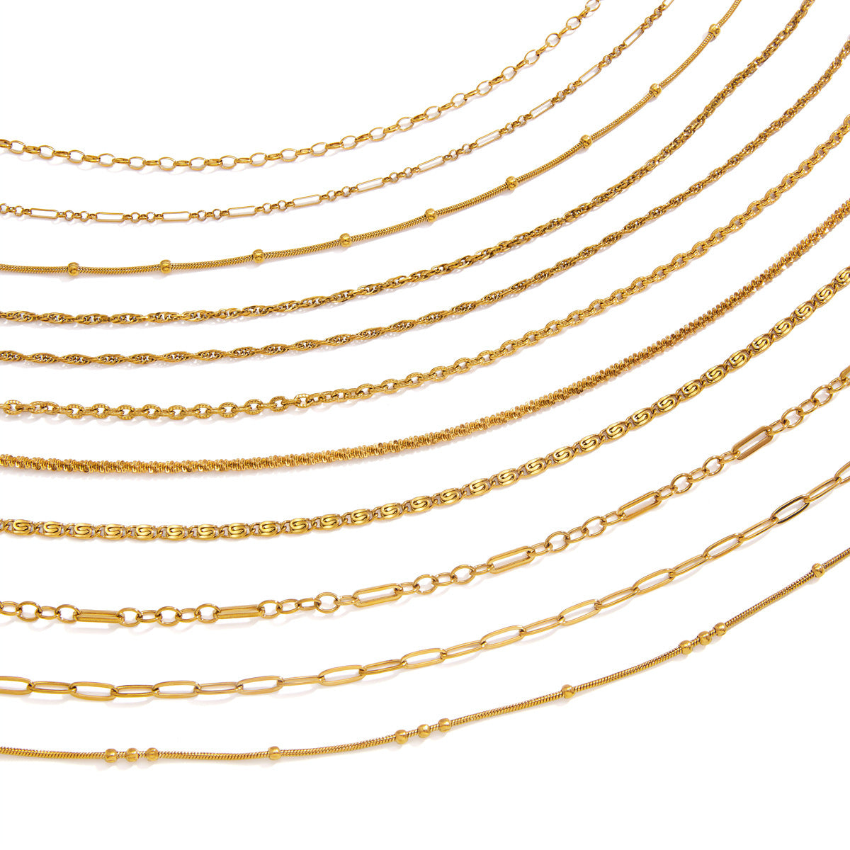 Gold tone chain necklace assortment on white