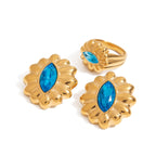 Gold-Tone Blue Zircon Floral Stainless Steel Ring – front view