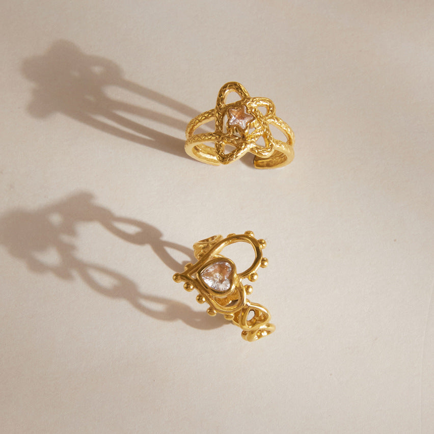 Gold tone openwork heart and star rings