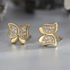 gold plated butterfly zirconia stud earrings in close-up
