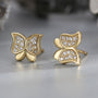 gold plated butterfly zirconia stud earrings in close-up