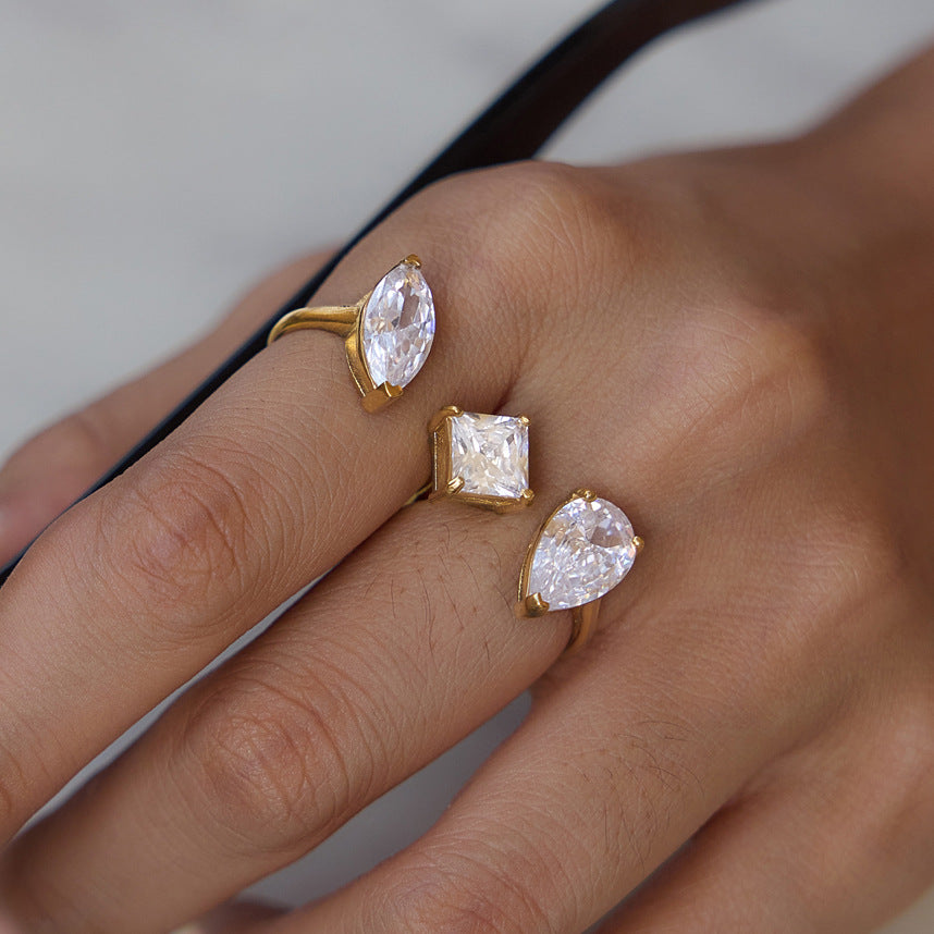 Close-up of three-shape zirconia ring on a hand