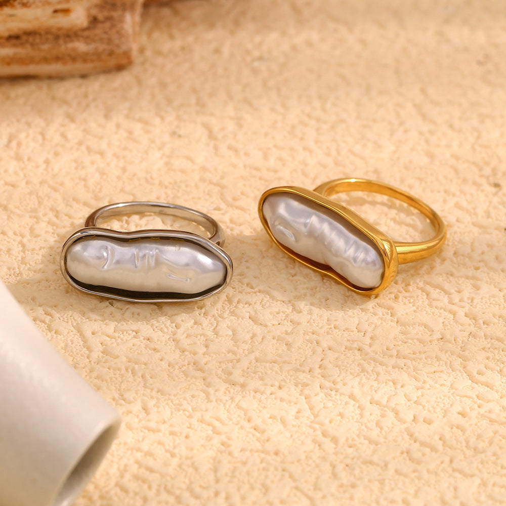 gold plated and silver-finish elongated pearl stainless steel rings