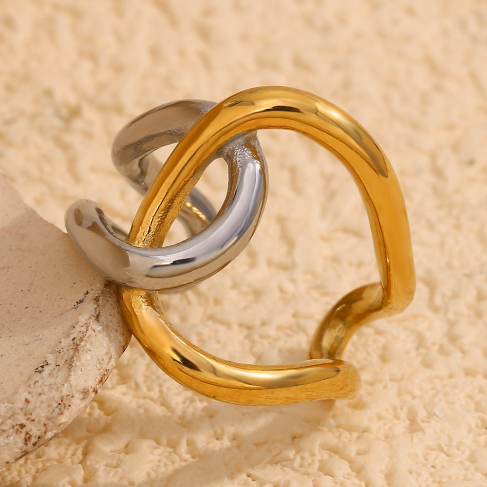 two-tone stainless steel open ring with interlocking gold and silver loops