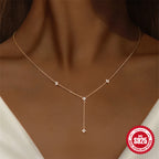 front-worn Y necklace with small floral zirconia stations