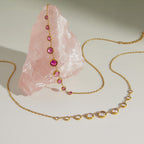 Two stone colorways arranged around a pale display rock