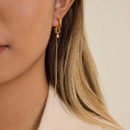 Gold-Tone Pearl-Look Tassel Stainless Steel Hoop Earrings shown on model