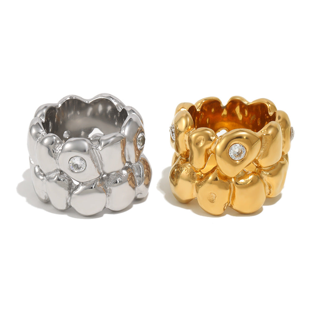 front view of the two sculptural pebble band finishes