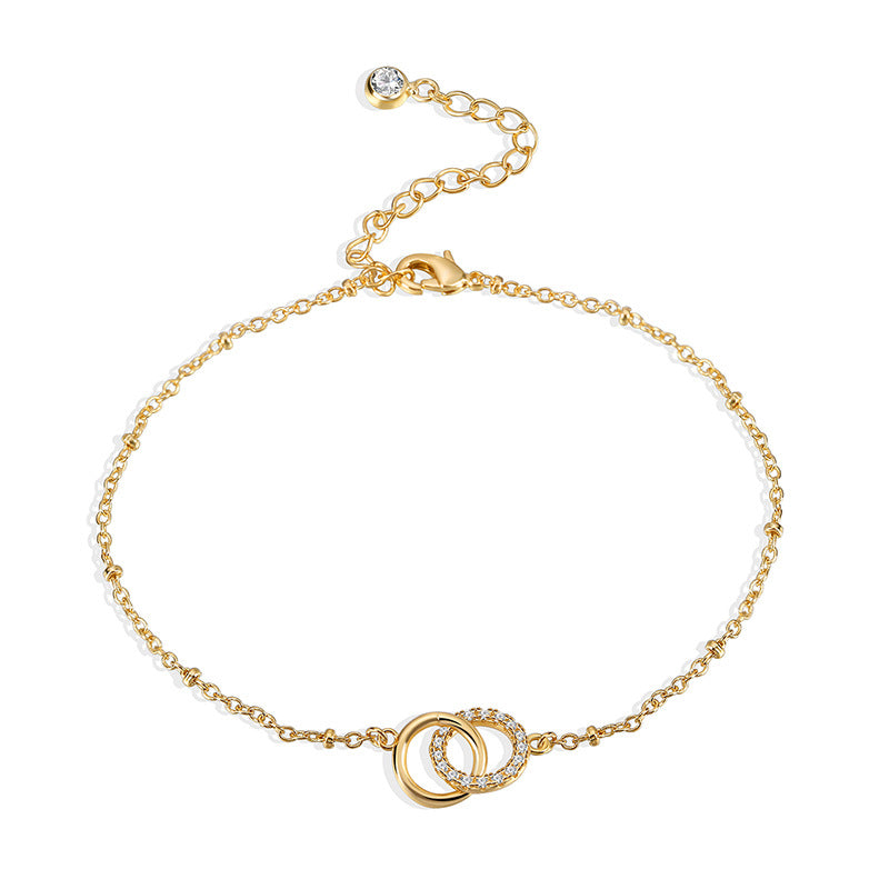 front product view of gold plated geometric zirconia anklet