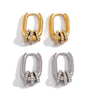 Front product view of oval stone charm hoops in two finishes