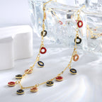 angled layout of the gold plated colorful resin charm necklace