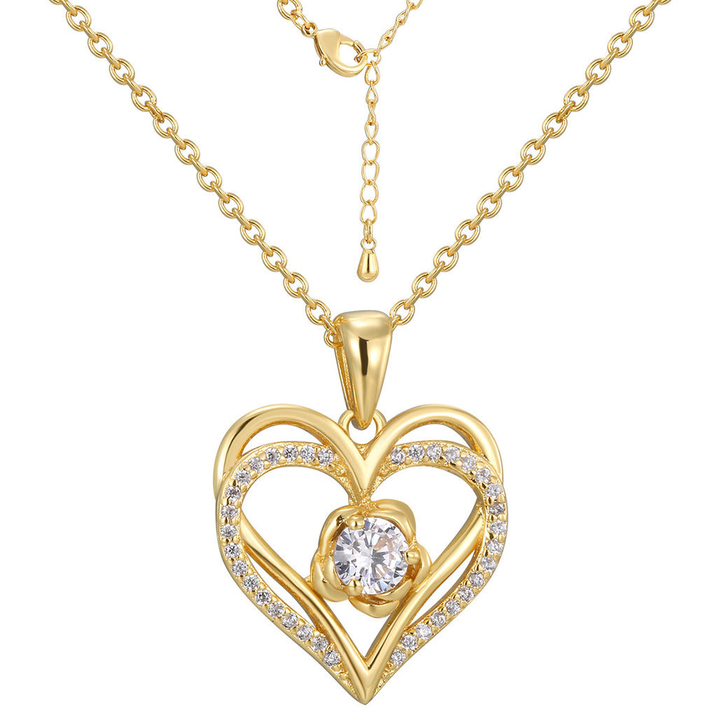 isolated gold plated double heart clear stone pendant necklace