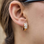 Close-up of three stacked clear stones on hoop