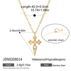Small shaped cross pendant with clear accents