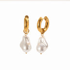 isolated front view of chunky gold plated pearl drop hoops