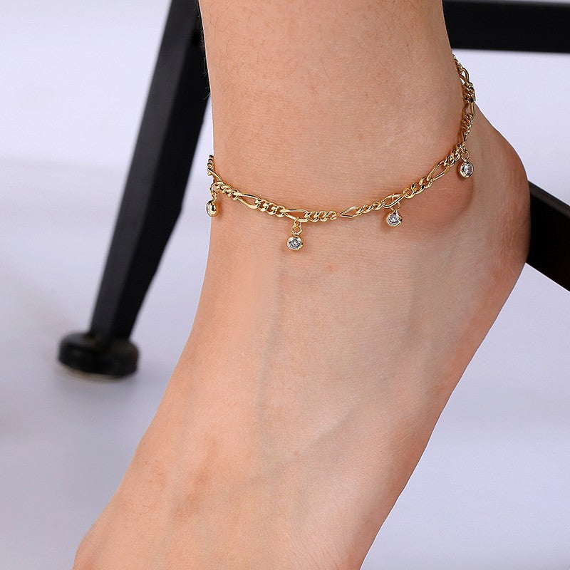 gold plated link anklet with five bezel-set zirconia charms