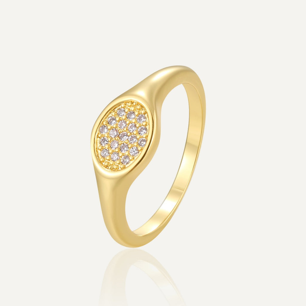 gold plated brass oval signet ring with clear pavé stones