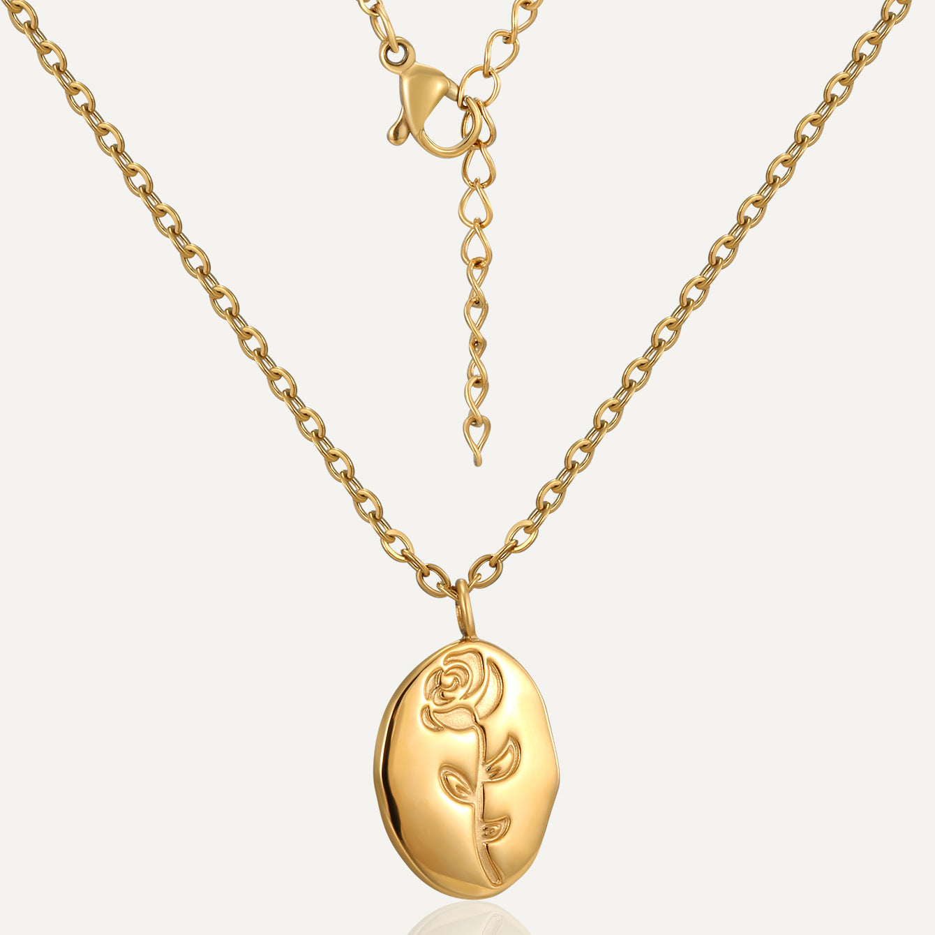 gold plated stainless steel necklace with a rose medallion pendant