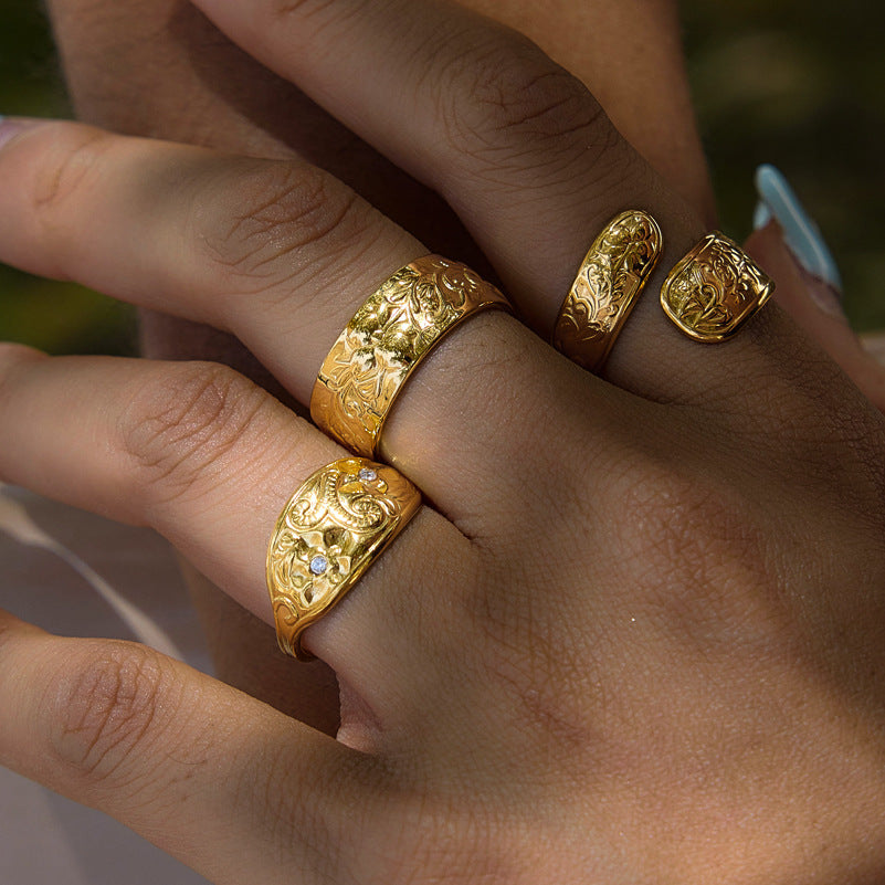 Close-up of decorative ring patterns on a hand