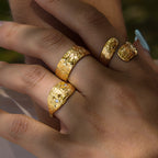 Close-up of decorative ring patterns on a hand