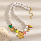 Full pearl-look bead necklace with botanical and fruit accents