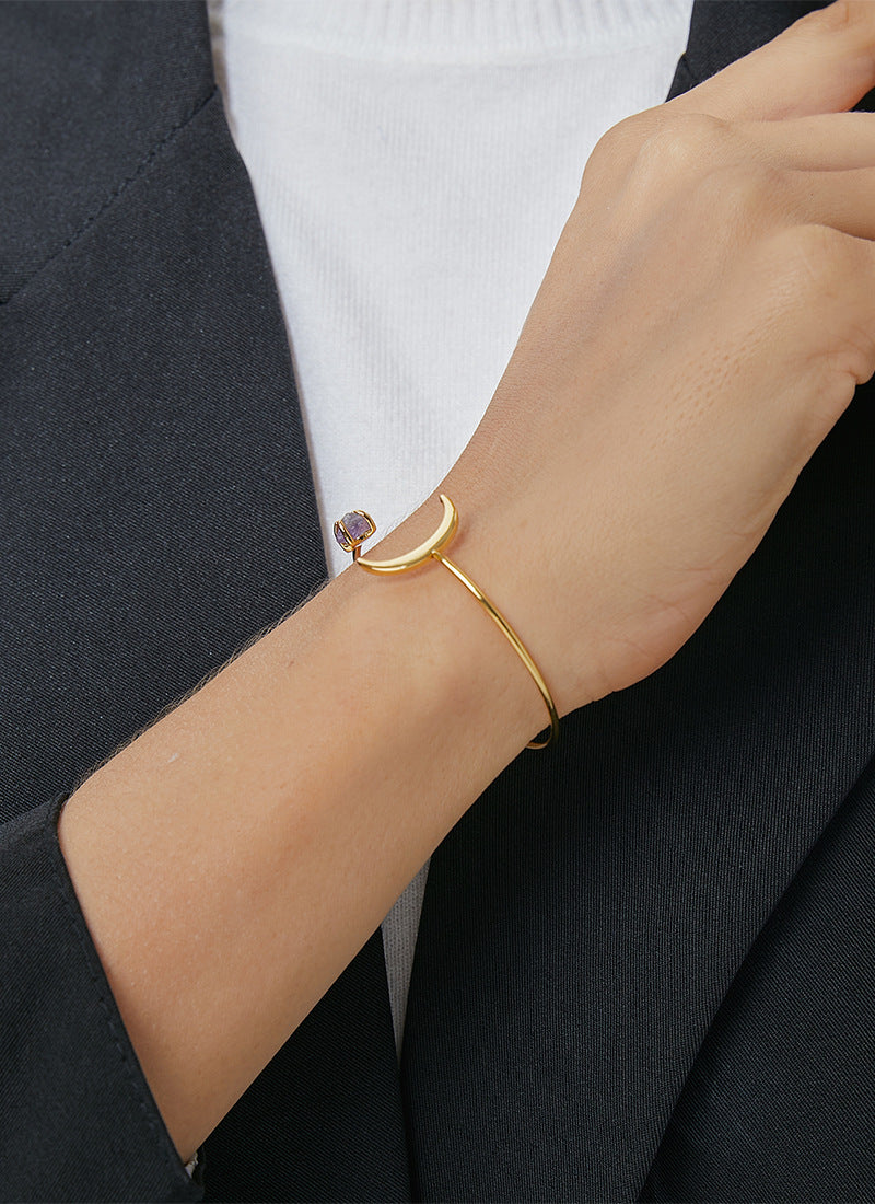 model styling the gold plated crescent purple stone cuff