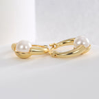 gold plated brass shell pearl huggie hoop earrings