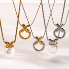 XO circle pendant necklaces shown with pearl-drop reference designs
