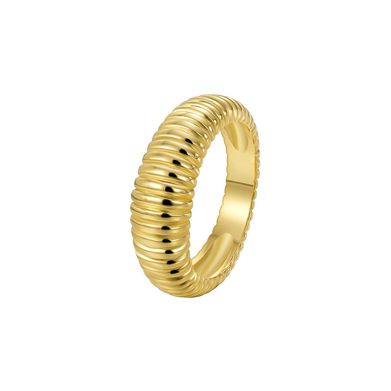 white-background view of textured gold plated dome ring