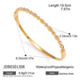 Linked oval clear accent gold-tone stainless steel bangle