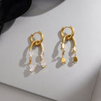 Front and back of arch pendants with hanging clear stones