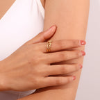 gold plated three-flower ring worn on the hand