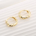 gold plated 925 sterling silver twisted pavé huggie hoop earrings — product image 4 of 9