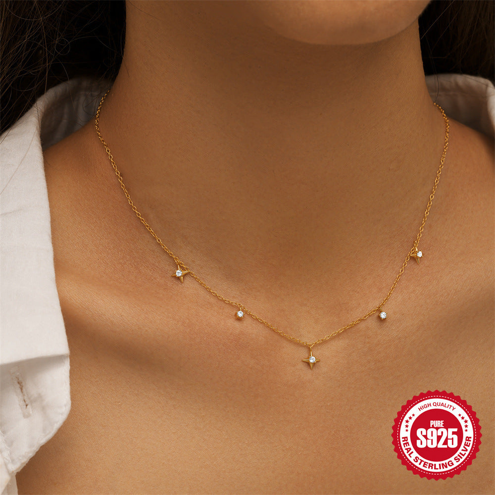 gold plated zirconia star necklace shown at collarbone length