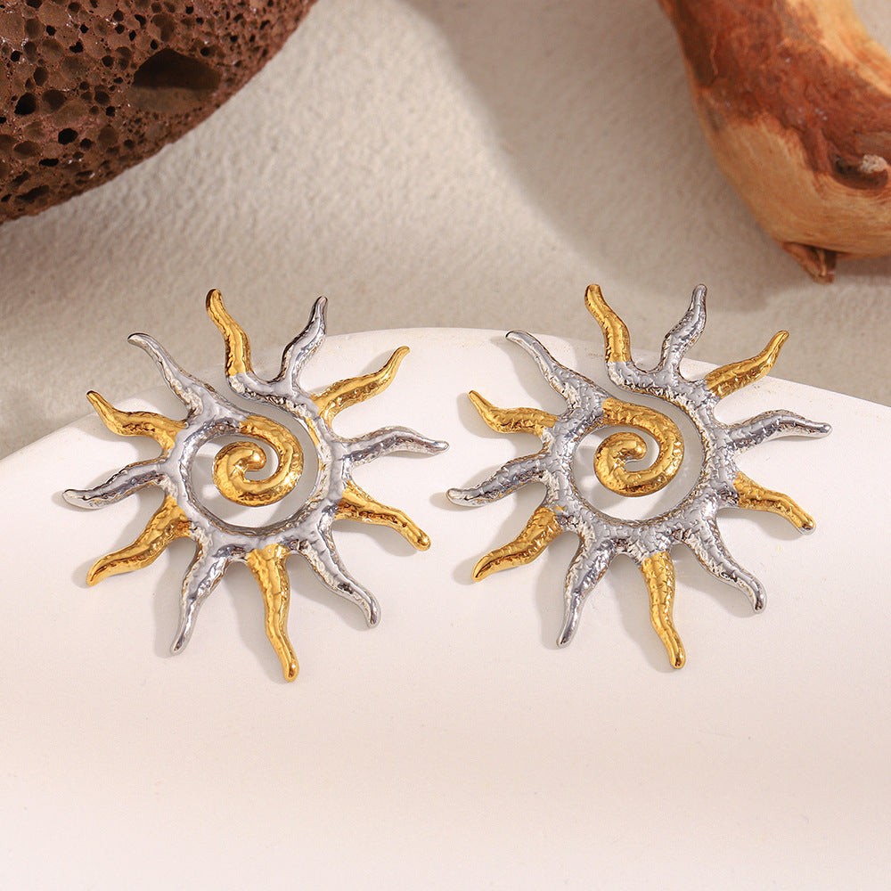 pair of irregular two-tone sunburst studs styled with natural wood