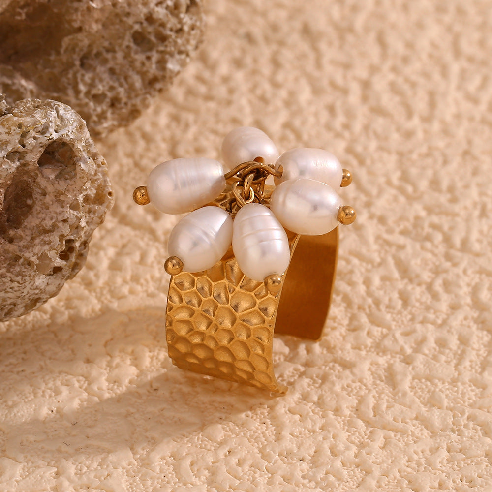 side angle of the gold plated open cuff ring with pearl drops