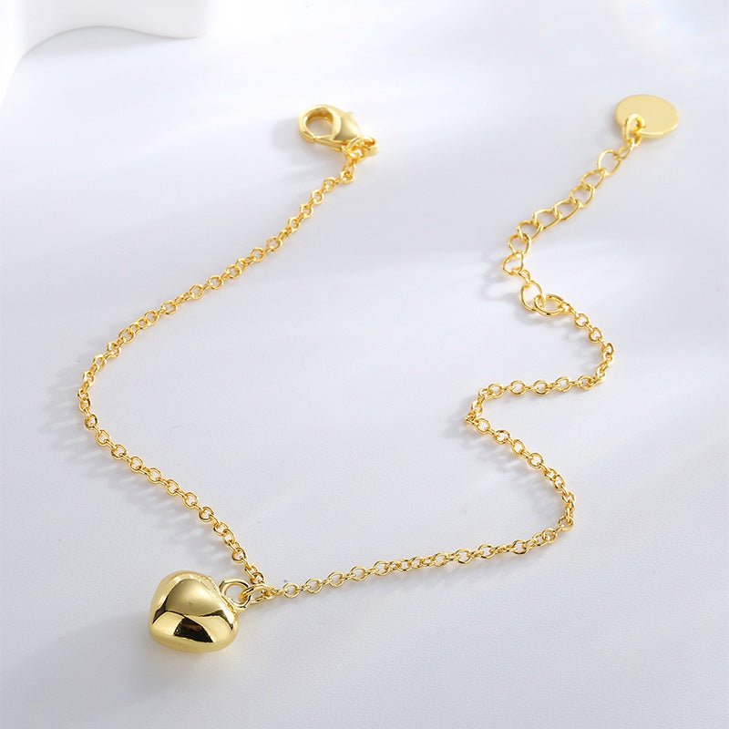 close view of the gold plated puffed heart pendant necklace