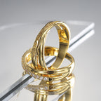stacked view of the gold plated brass crossover ring set