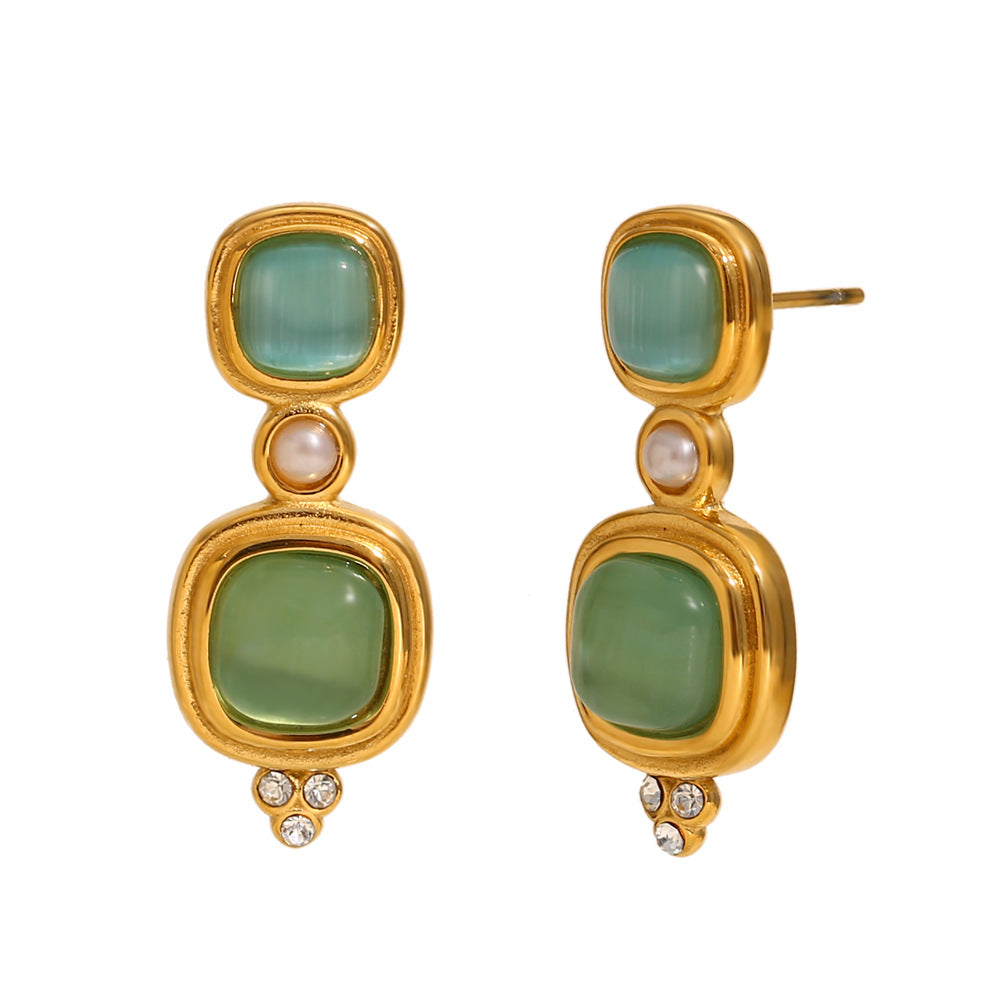 front and side view of gold plated green cabochon drop earrings