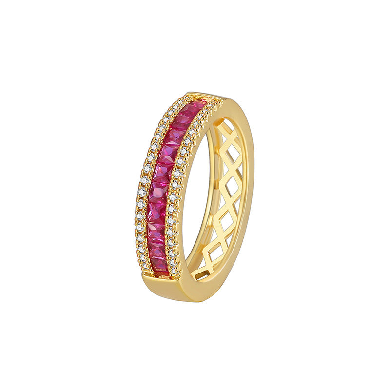 white-background view of red zirconia and clear accent band ring
