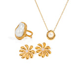 White-accent ring and pendant necklace shown with flower earring references