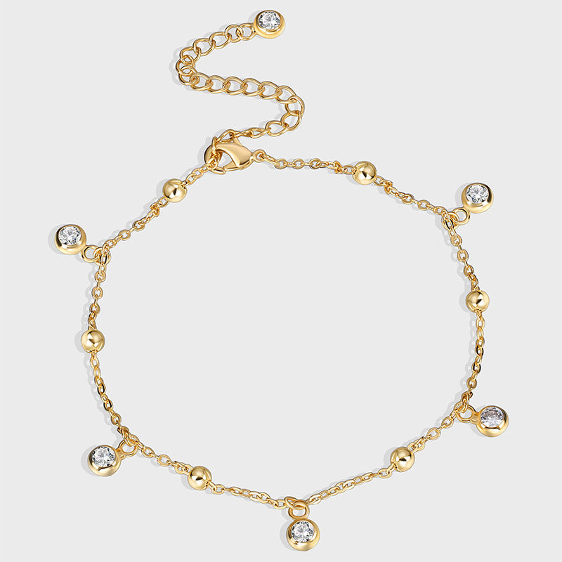 gold plated brass beaded anklet with cubic zirconia drops