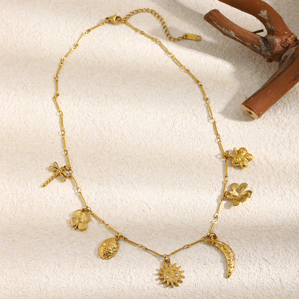 full view of the gold plated stainless steel multi-charm necklace