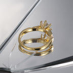 rear view of gold plated solitaire ring showing open basket setting