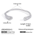Silver-tone open cuff with rounded tapered ends
