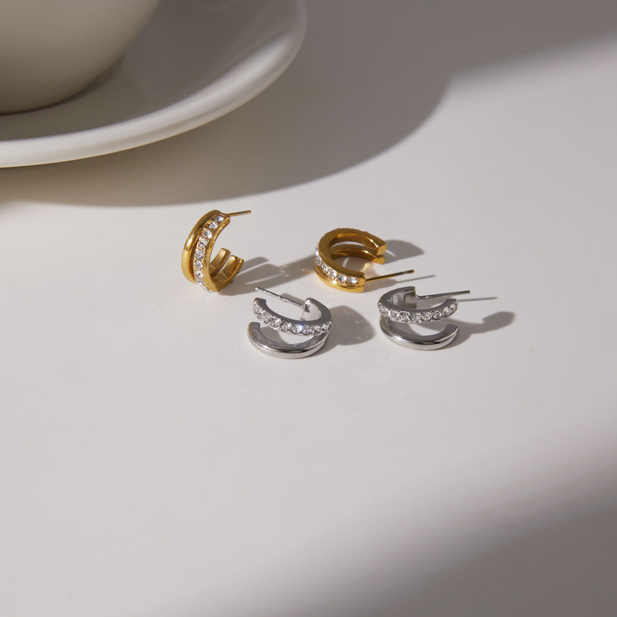 Stainless Steel Hoop, Ear Cuff and Heart Stud Earring Collection on-model view