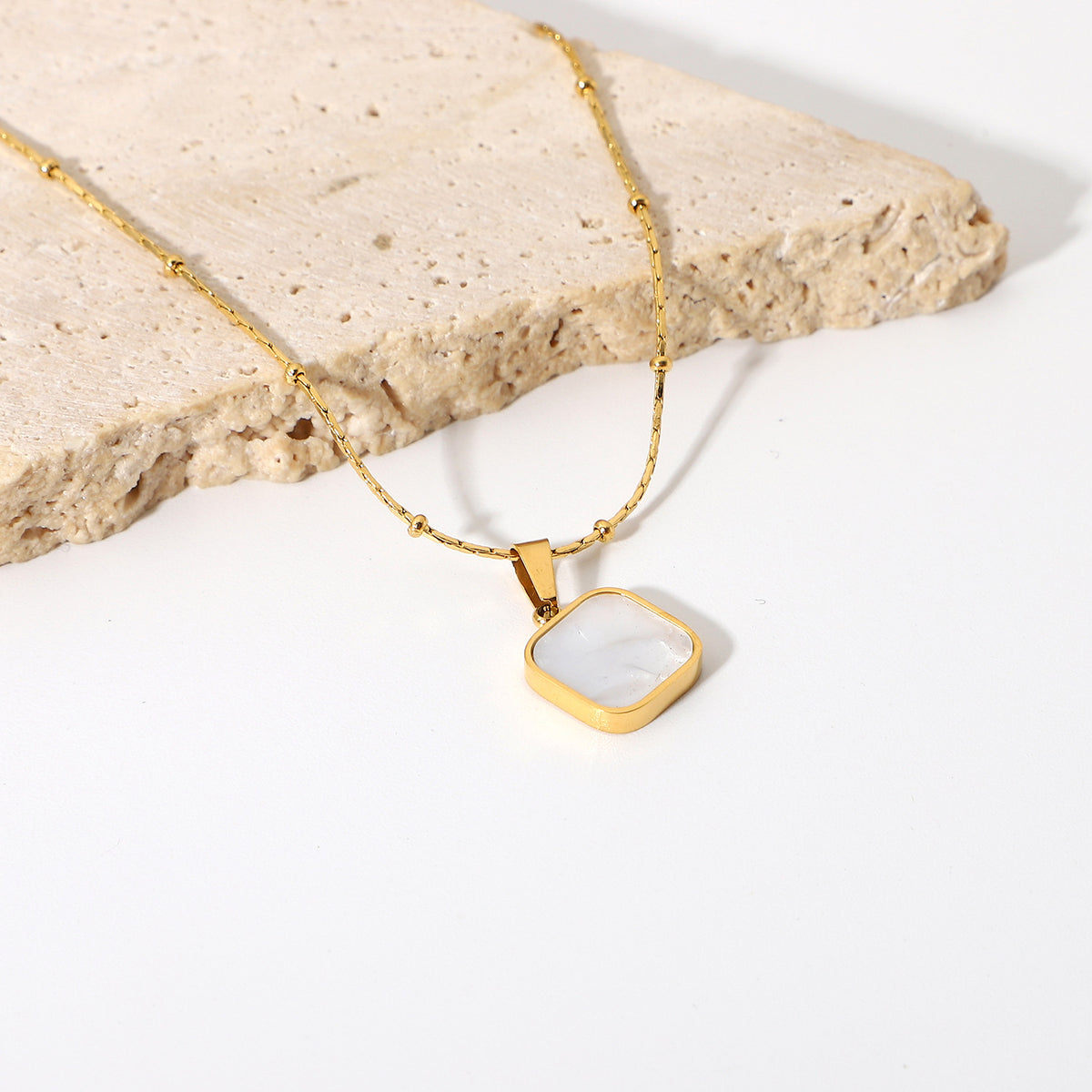 Gold Plated Stainless Steel White Inlay Square Pendant Necklace — square inlay close-up